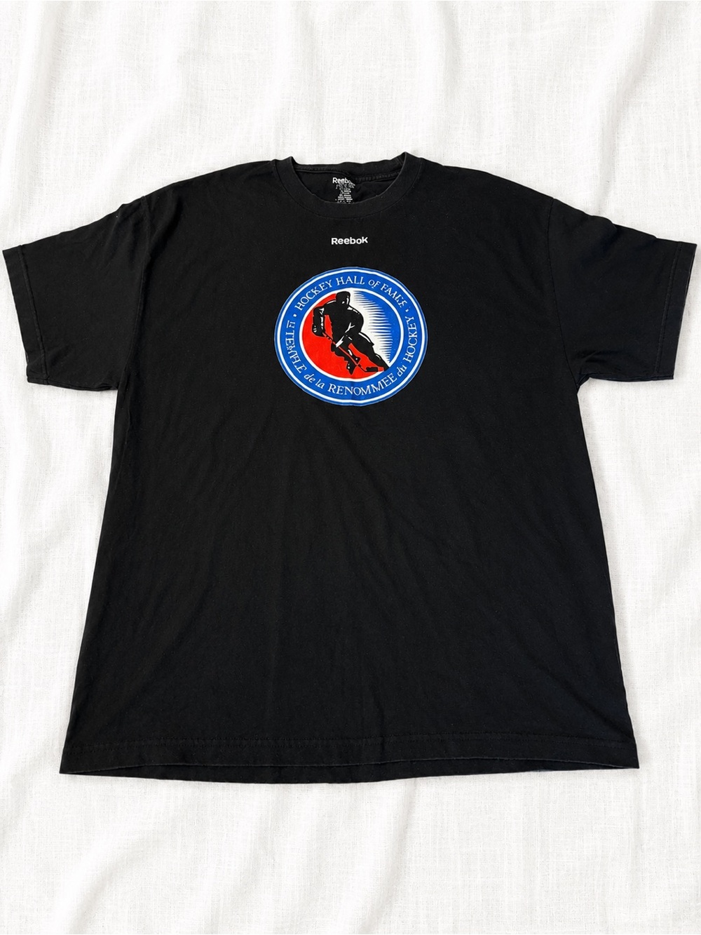 Reebok Black Hockey Hall of Fame Graphic Tee with Blue and Red Logo